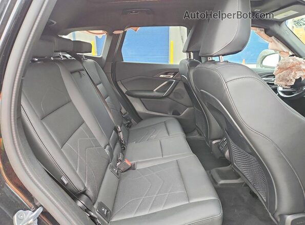 WBX73EF05R5Z81536 2024 BMW X1 Black Vista interior trasera