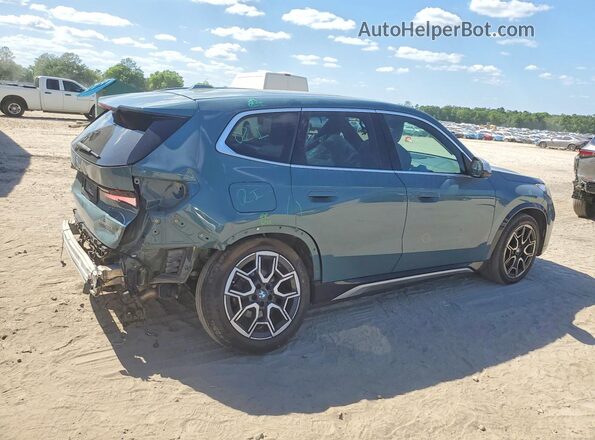 WBX73EF06R5Z74918 2024 BMW X1 Teal Rear right