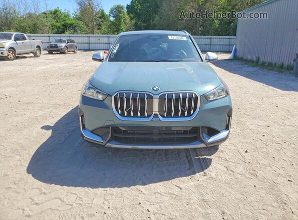 WBX73EF06R5Z74918 2024 BMW X1 Teal Front view
