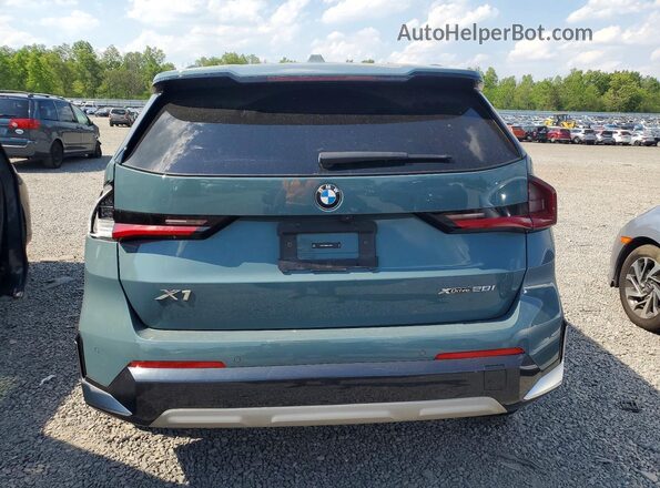 WBX73EF08P5X73907 2023 BMW X1 Teal Вид ззаду