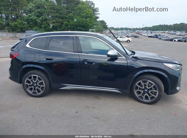 WBX73EF08R5Z01100 2024 BMW X1 Black Вид задньої частини салону