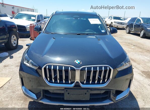 WBX73EF0XS5041772 2025 BMW X1 Black Вид задньої частини салону