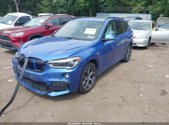 WBXHT3C30G5E48615 2016 BMW X1 Blue წინა მარცხენა ხედი სამი მეოთხედიდან