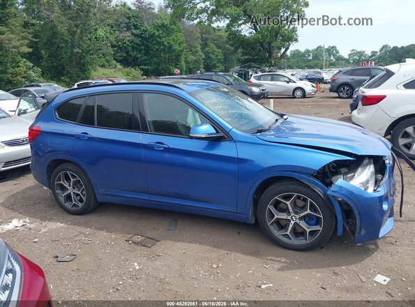 WBXHT3C30G5E48615 2016 BMW X1 Blue უკანა სალონის ხედი