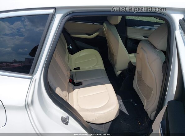WBXHT3C30G5E53412 2016 BMW X1 White Вид наклейки з VIN-кодом