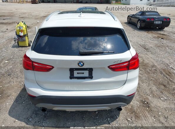 WBXHT3C30G5E53412 2016 BMW X1 White 
