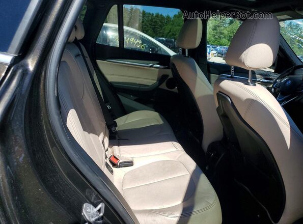 WBXHT3C30GP886939 2016 BMW X1 Brown Սալոնի հետևի տեսք