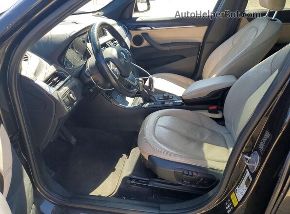 WBXHT3C30GP886939 2016 BMW X1 Brown Սալոնի դիմացի տեսք