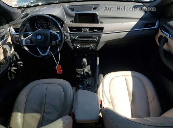 WBXHT3C30GP886939 2016 BMW X1 Brown Առջևի վահանակի տեսք