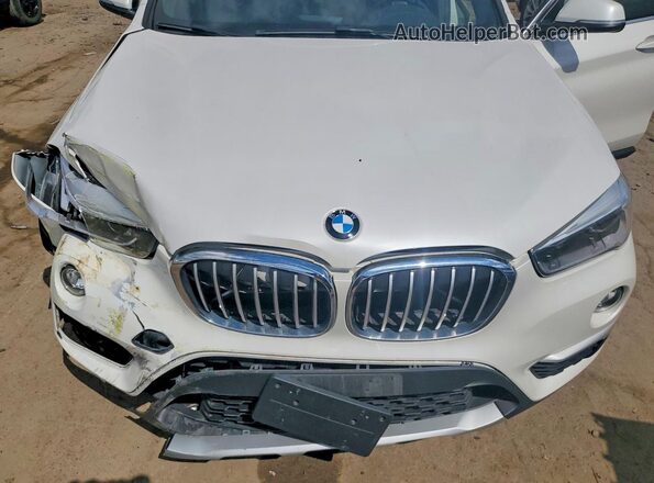 WBXHT3C30H5F75396 2017 BMW X1 White უკანა სალონის ხედი