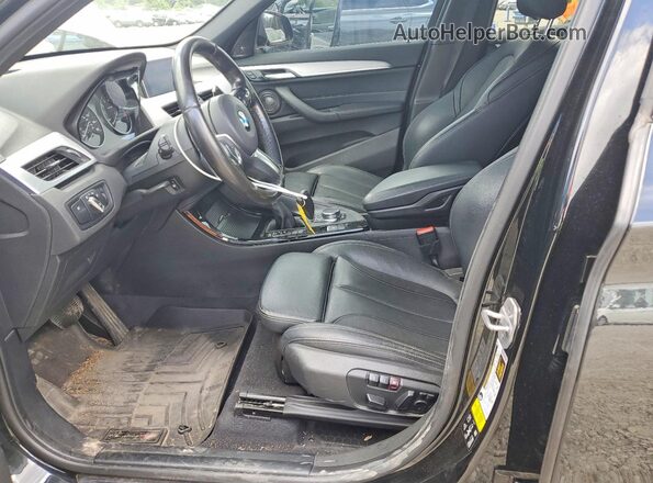 WBXHT3C30H5F83790 2017 BMW X1 Black Սալոնի դիմացի տեսք