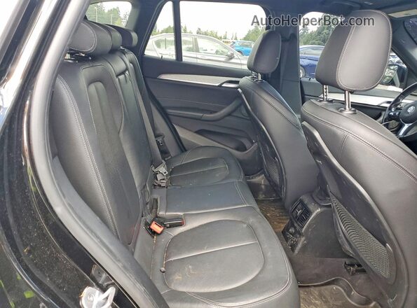 WBXHT3C30H5F83790 2017 BMW X1 Black Հետևի նստատեղերի տեսք