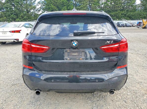 WBXHT3C30H5F83790 2017 BMW X1 Black Հետևի տեսք