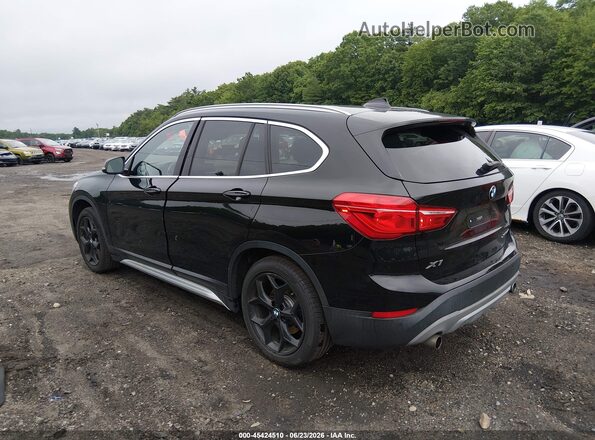 WBXHT3C30J5L29886 2018 BMW X1 Black Tył lewy