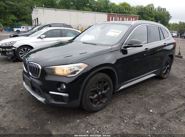 WBXHT3C30J5L29886 2018 BMW X1 Black Przód lewy