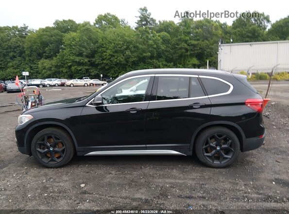 WBXHT3C30J5L29886 2018 BMW X1 Black Widok wnętrza 360 stopni