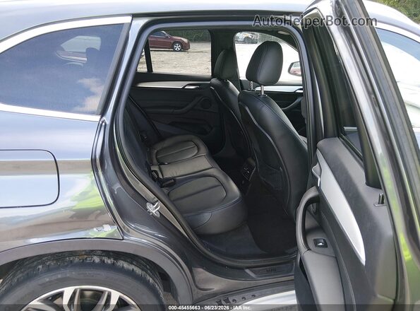 WBXHT3C31GP883323 2016 BMW X1 Gray VIN sticker view