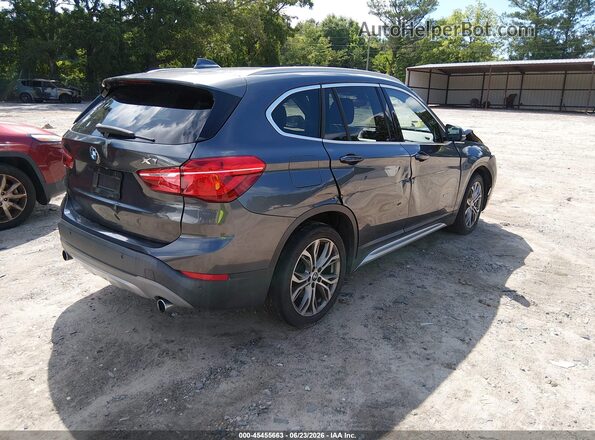 WBXHT3C31GP883323 2016 BMW X1 Gray Rear right