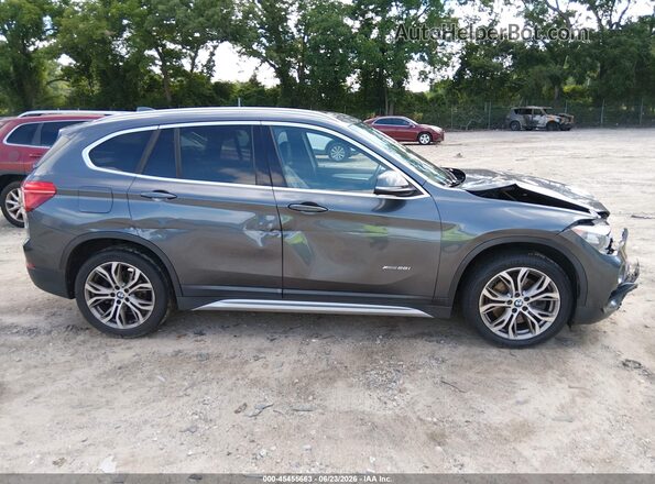 WBXHT3C31GP883323 2016 BMW X1 Gray Rear interior view