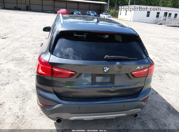 WBXHT3C31GP883323 2016 BMW X1 Gray 