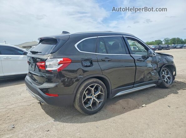 WBXHT3C31H5F77643 2017 BMW X1 Black Tył prawy