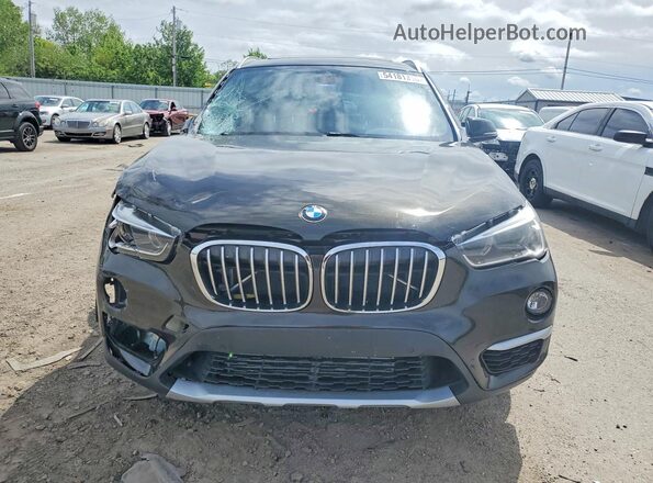 WBXHT3C31H5F77643 2017 BMW X1 Black Widok z przodu