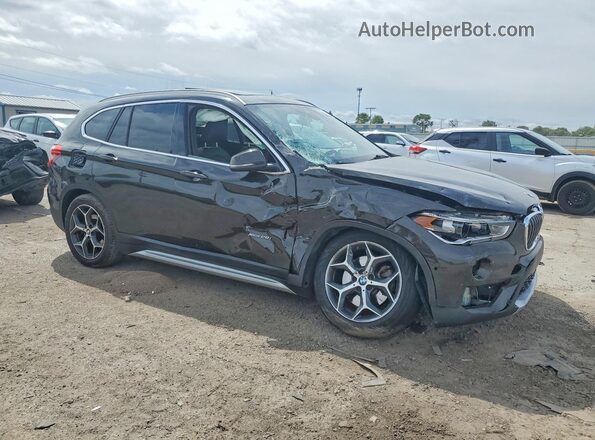 WBXHT3C31H5F77643 2017 BMW X1 Black Przód prawy