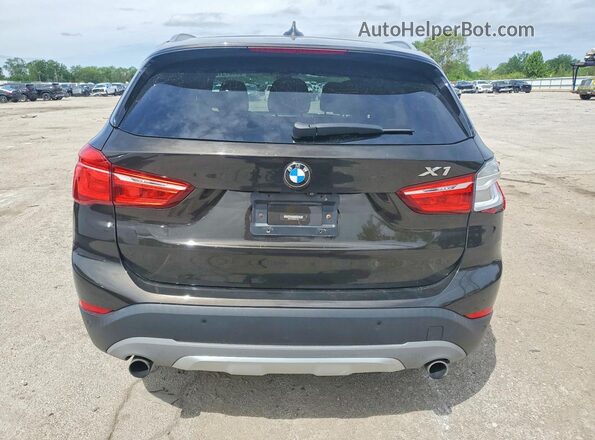 WBXHT3C31H5F77643 2017 BMW X1 Black Widok z tyłu