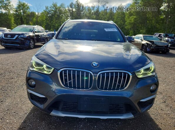 WBXHT3C32G5E53881 2016 BMW X1 Gray Դիմացի տեսք
