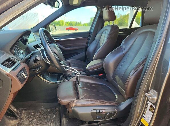 WBXHT3C32G5E53881 2016 BMW X1 Gray Սալոնի դիմացի տեսք