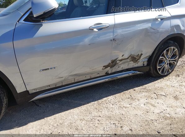 WBXHT3C32H5F74296 2017 BMW X1 Silver Вид спереду