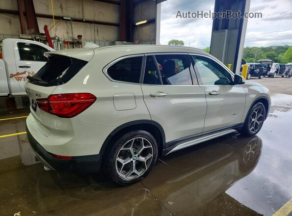 WBXHT3C32H5F78977 2017 BMW X1 White Rear right