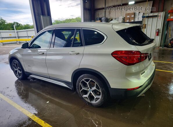 WBXHT3C32H5F78977 2017 BMW X1 White Rear left
