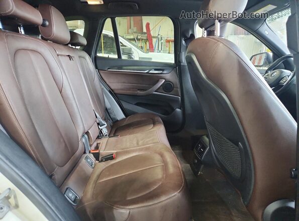 WBXHT3C32H5F78977 2017 BMW X1 White Rear interior view
