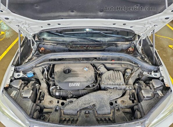 WBXHT3C32H5F78977 2017 BMW X1 White Engine compartment view