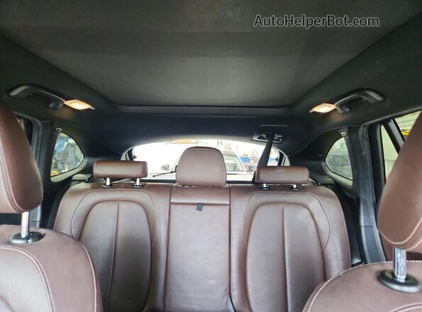 WBXHT3C32H5F78977 2017 BMW X1 White Rear seats view