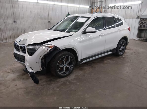 WBXHT3C32J5L31168 2018 BMW X1 White Vista tres cuartos delantera izquierda