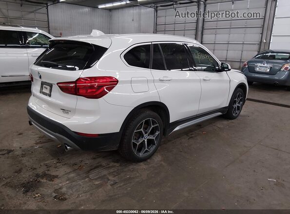WBXHT3C32J5L31168 2018 BMW X1 White Trasero derecho