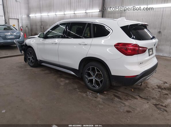 WBXHT3C32J5L31168 2018 BMW X1 White Trasero izquierdo