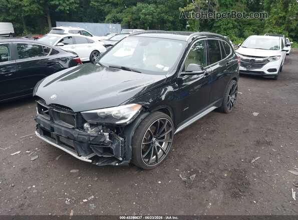 WBXHT3C33G5E54344 2016 BMW X1 Black Front left