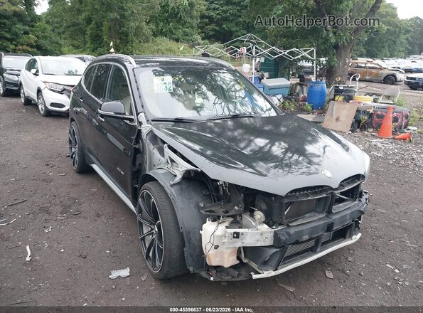 WBXHT3C33G5E54344 2016 BMW X1 Black Front view