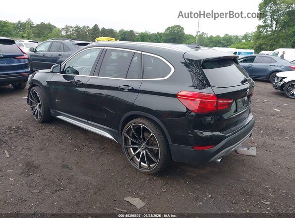 WBXHT3C33G5E54344 2016 BMW X1 Black Rear left