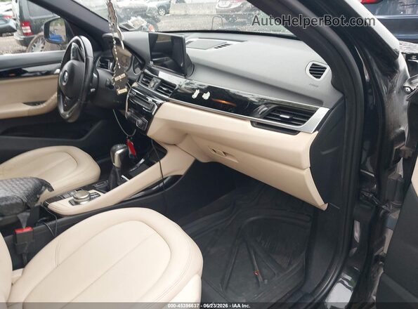WBXHT3C33G5E54344 2016 BMW X1 Black Front interior view