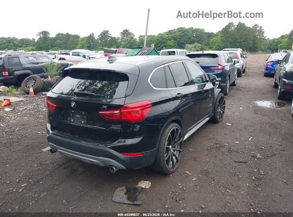 WBXHT3C33G5E54344 2016 BMW X1 Black Rear right