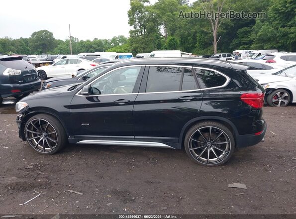 WBXHT3C33G5E54344 2016 BMW X1 Black 360 interior view