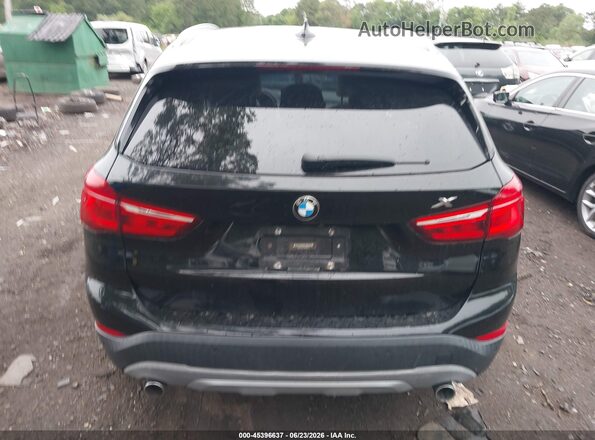 WBXHT3C33G5E54344 2016 BMW X1 Black 