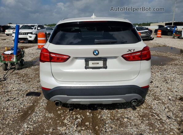WBXHT3C33G5E56496 2016 BMW X1 White Հետևի տեսք