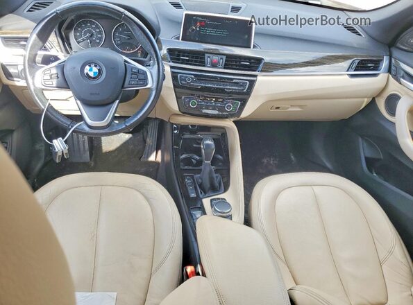 WBXHT3C33G5E56496 2016 BMW X1 White Առջևի վահանակի տեսք
