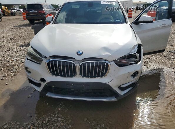 WBXHT3C33G5E56496 2016 BMW X1 White Սալոնի հետևի տեսք