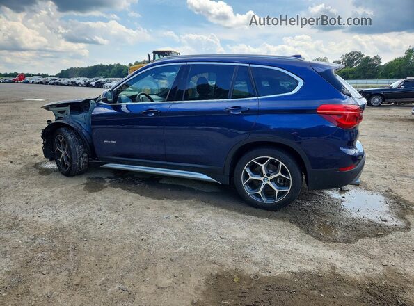 WBXHT3C33GP880665 2016 BMW X1 Blue Rear left